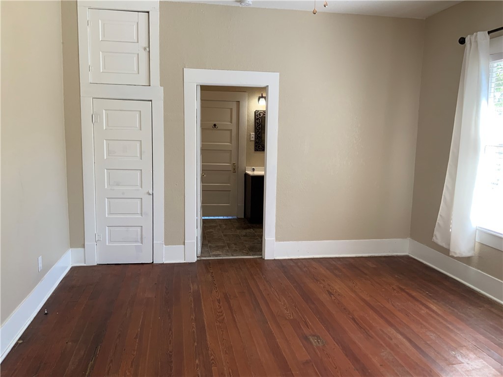 207 North Archer Street Groesbeck, TX 76642 - Photo 16 of 25 wooden floor in an empty room