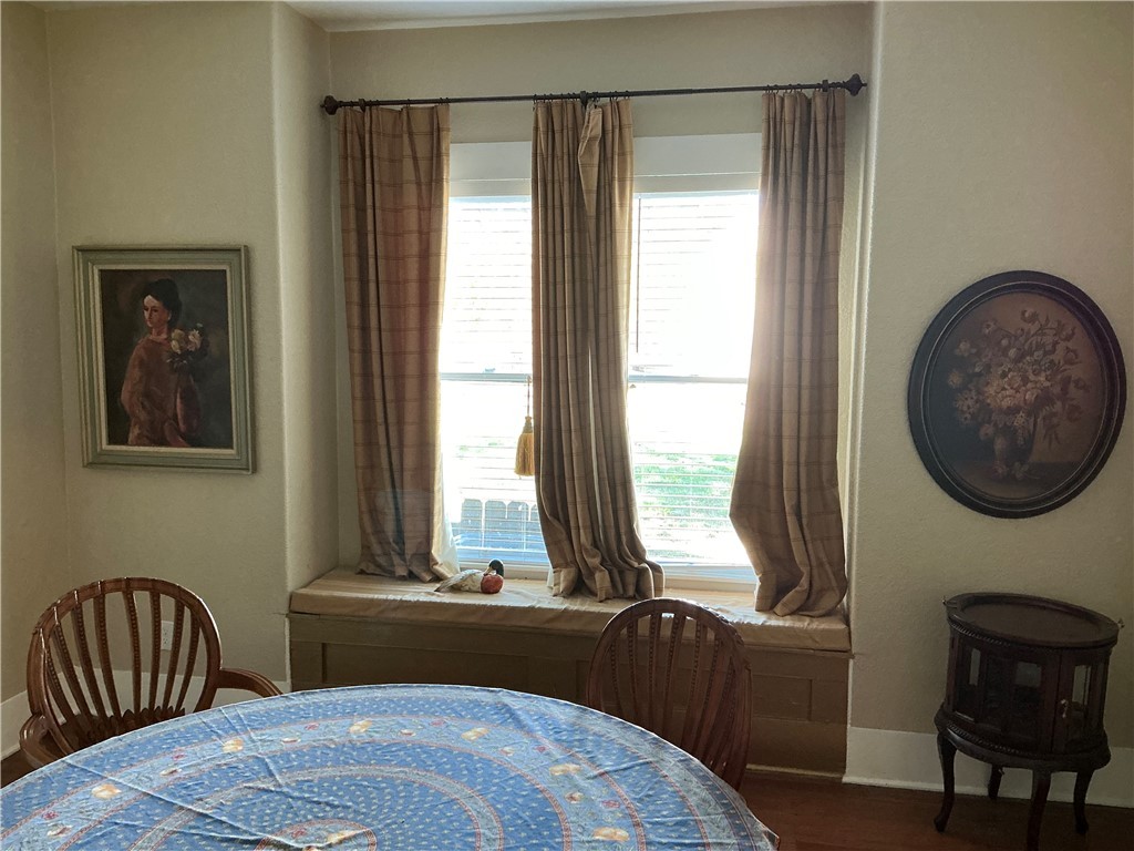 207 North Archer Street Groesbeck, TX 76642 - Photo 20 of 25 a bedroom with a bed and a window