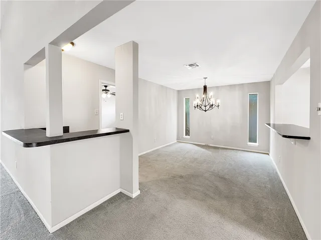 a view of a kitchen with a sink