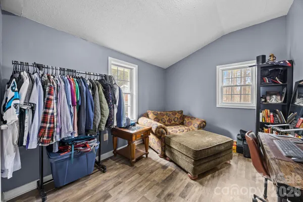 a bedroom with a bed and a closet