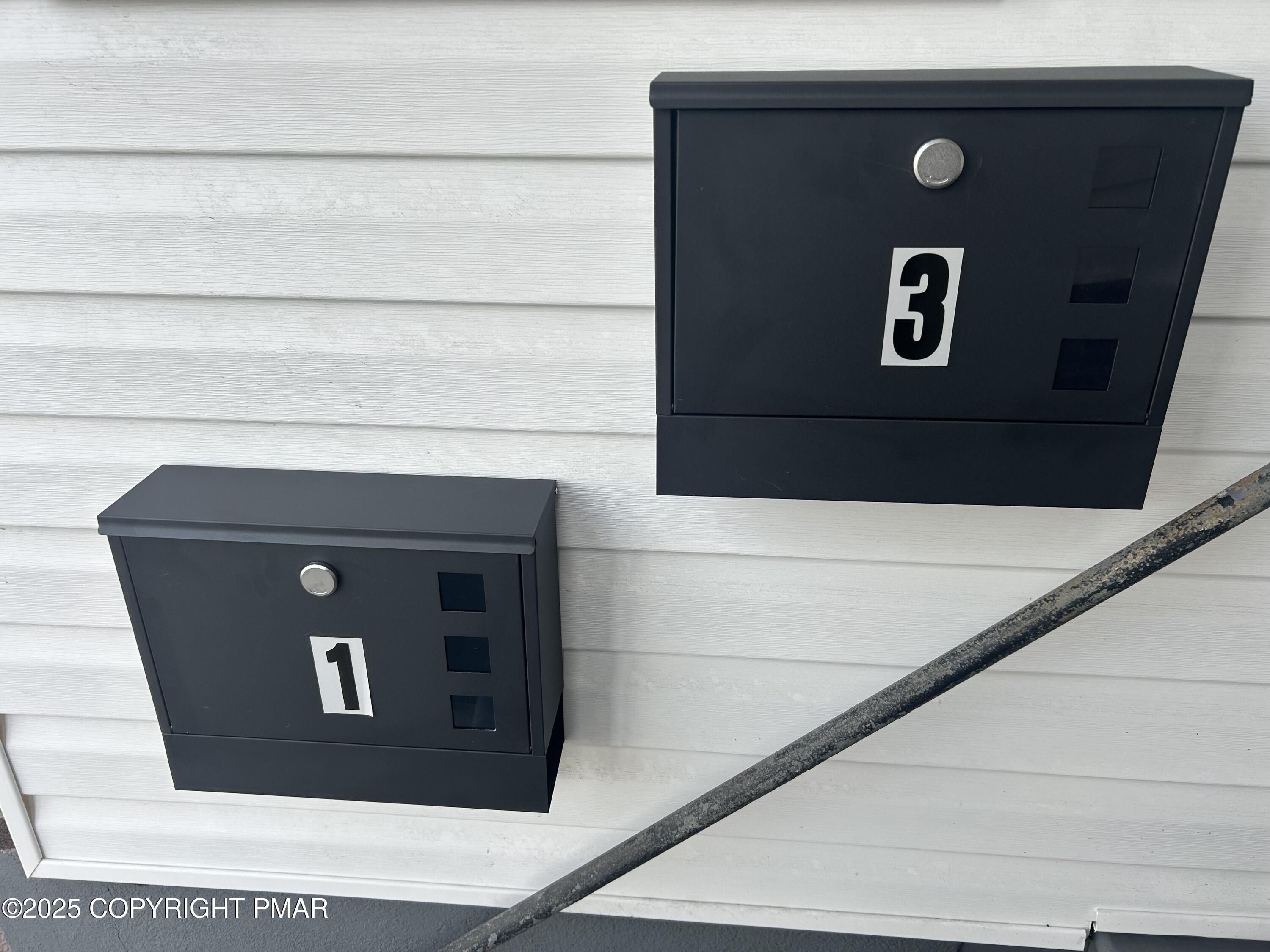 222 West Patterson Street, Unit 1 Lansford, PA 18232 - Photo 12 of 12 a building with a door