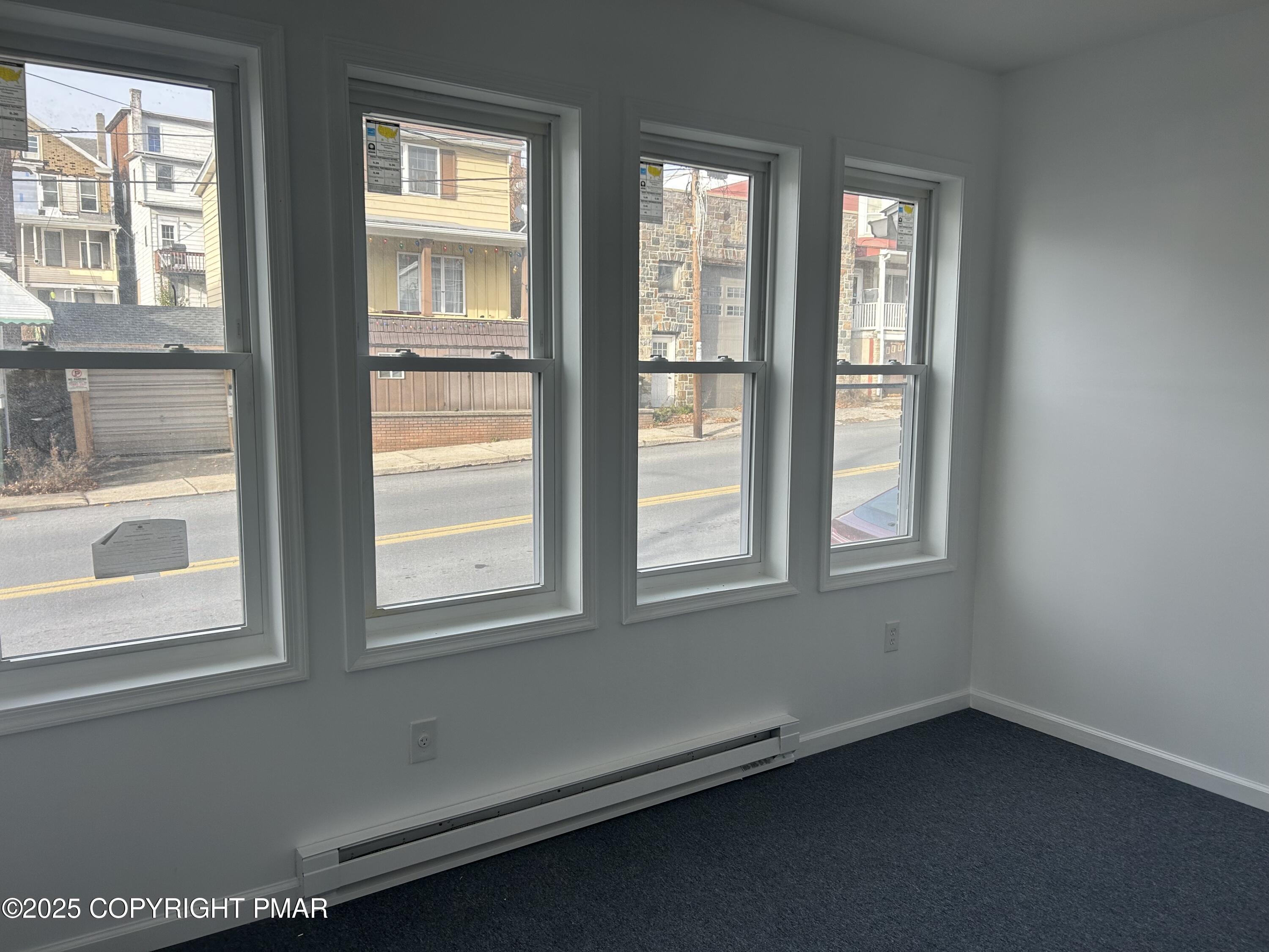 222 West Patterson Street, Unit 1 Lansford, PA 18232 - Photo 2 of 12 an empty room with a window