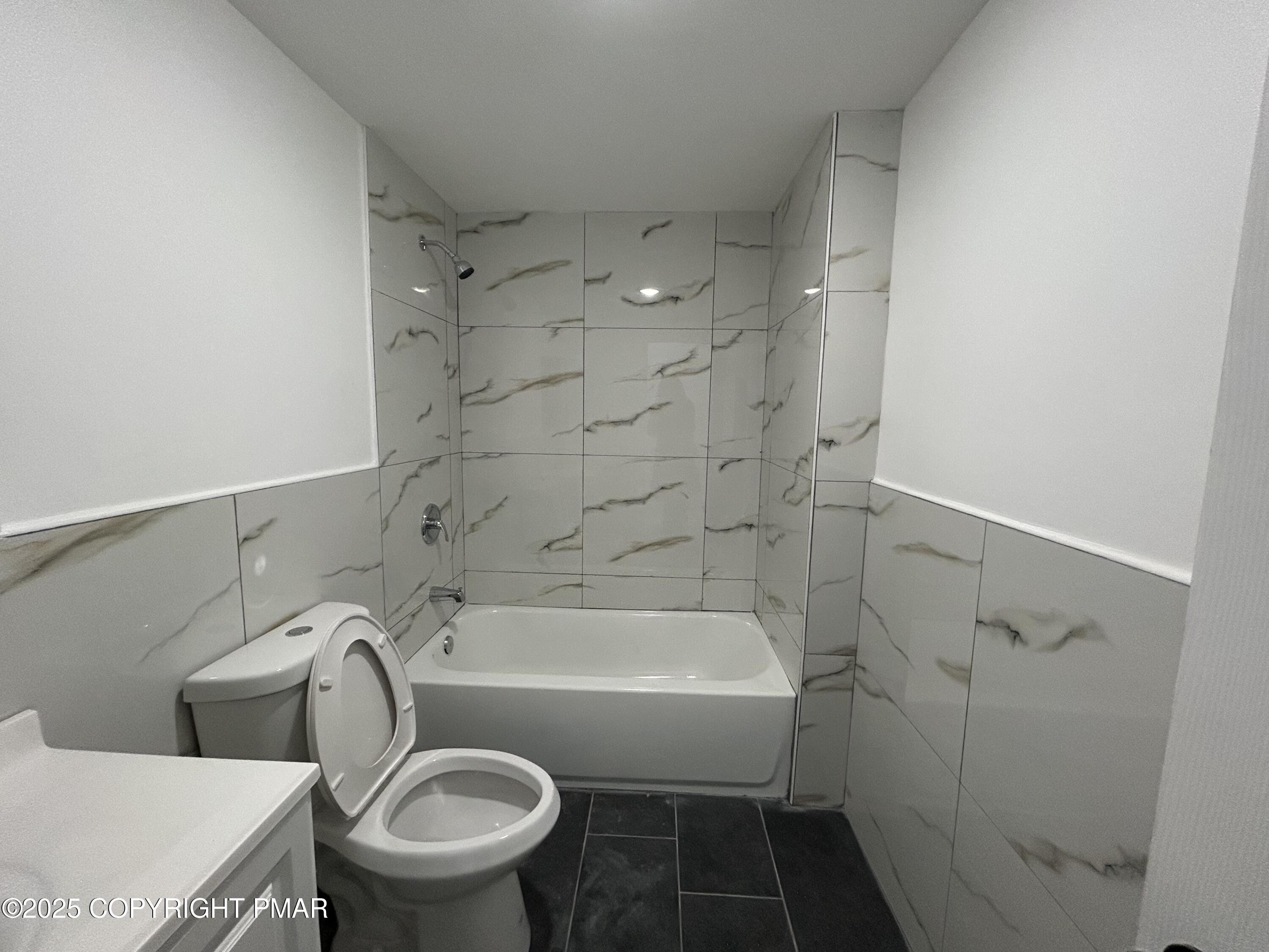 222 West Patterson Street, Unit 1 Lansford, PA 18232 - Photo 6 of 12 a bathroom with a sink and a toilet