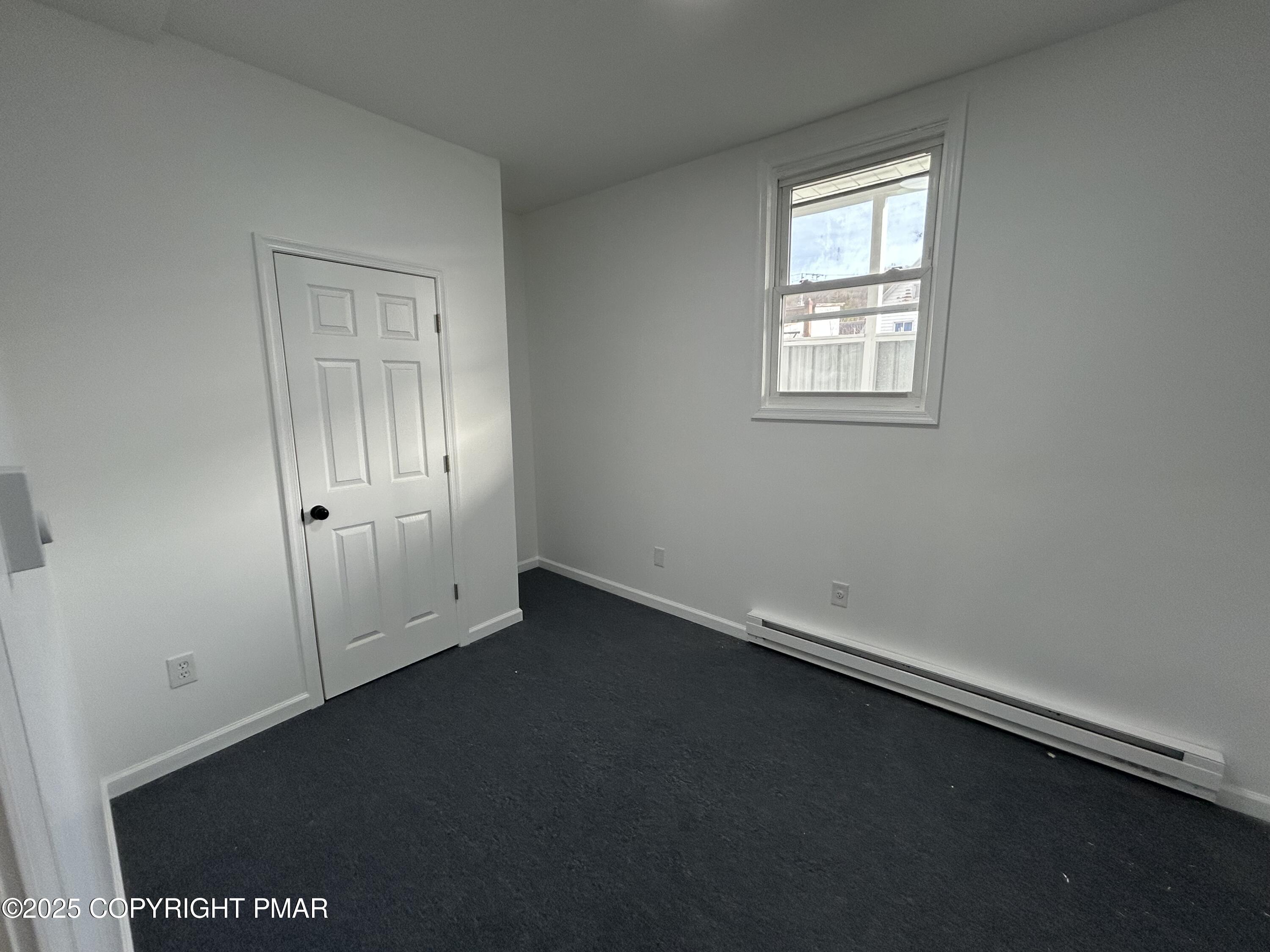 222 West Patterson Street, Unit 1 Lansford, PA 18232 - Photo 9 of 12 an empty room with a door