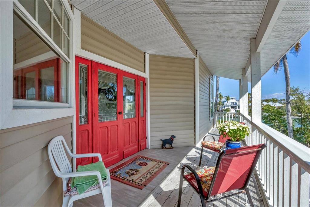 1660 16th Street East Boca Grande, FL 33921 - Photo 25 of 48 a view of an outdoor sitting area with furniture