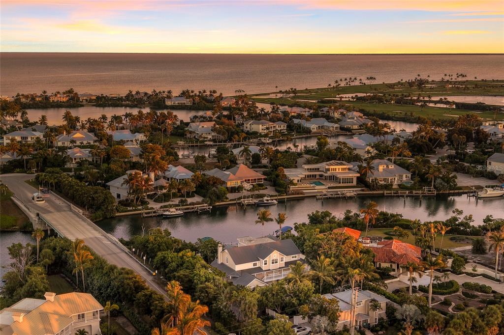1660 16th Street East Boca Grande, FL 33921 - Photo 43 of 48 an aerial view of a city with lots of residential buildings lake and ocean view