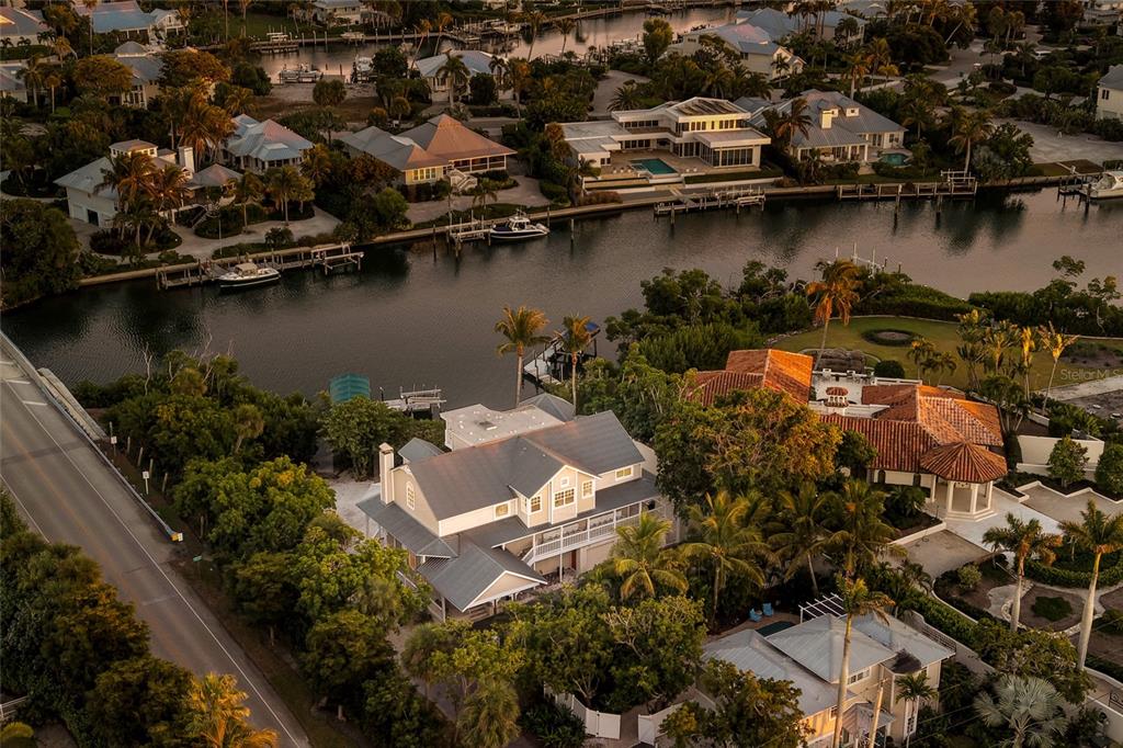 1660 16th Street East Boca Grande, FL 33921 - Photo 44 of 48 an aerial view of a house with a lake view