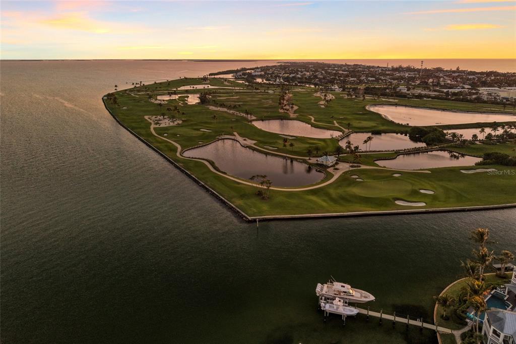 1660 16th Street East Boca Grande, FL 33921 - Photo 48 of 54 an aerial view of a house with a ocean view