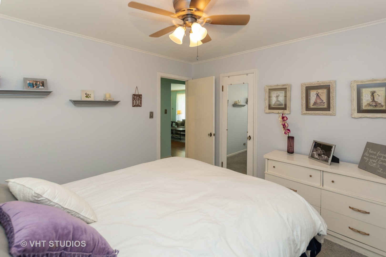 2233 Spruce Road Homewood, IL 60430 - Photo 12 of 17 a bedroom with a bed and a chandelier