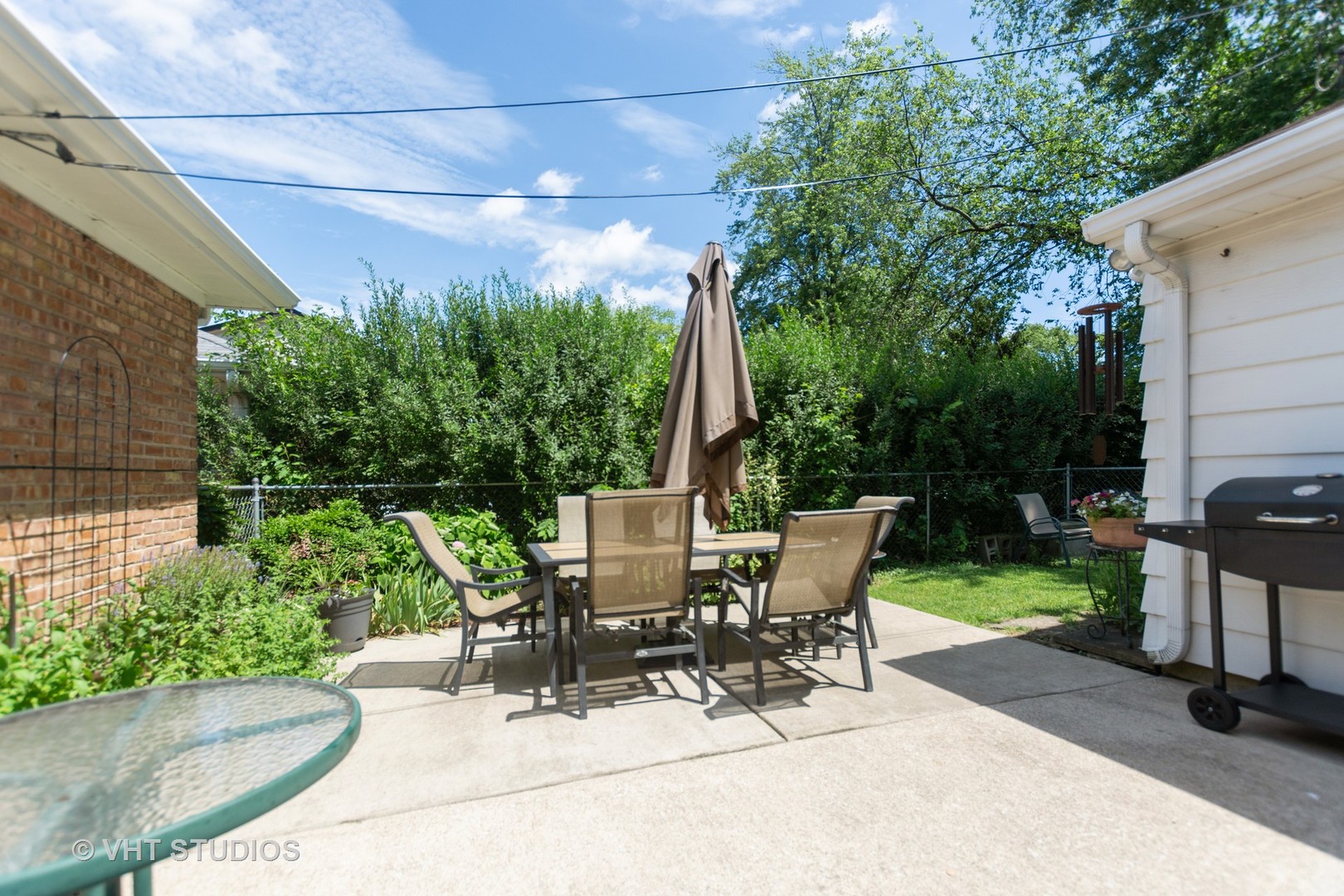 2233 Spruce Road Homewood, IL 60430 - Photo 16 of 17 a view of backyard with seating area and green space