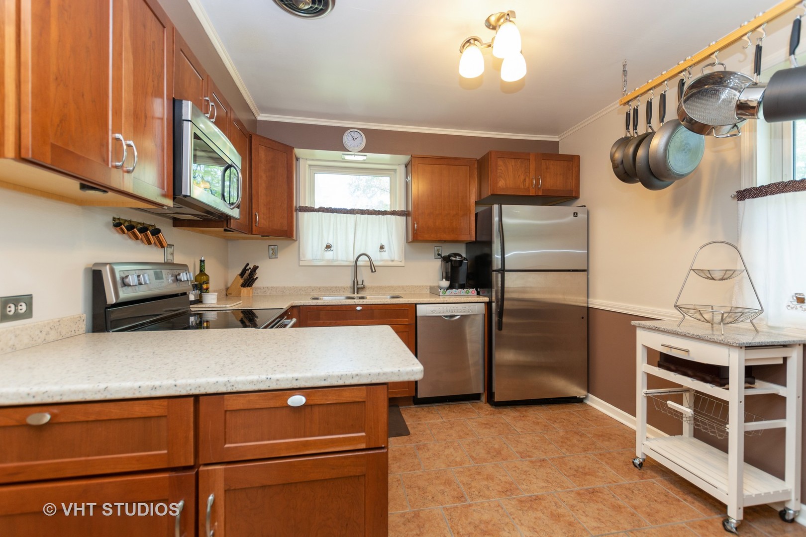 2233 Spruce Road Homewood, IL 60430 - Photo 6 of 17 a kitchen with stainless steel appliances granite countertop a stove and a sink