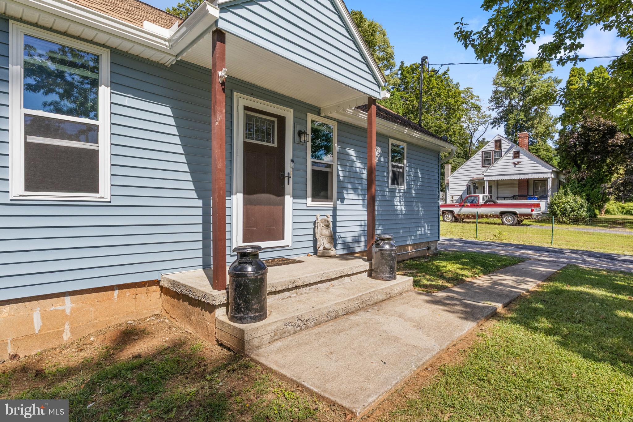 575 Cassel Road Manchester, PA 17345 - Photo 2 of 33 Charming blue home with inviting porch.