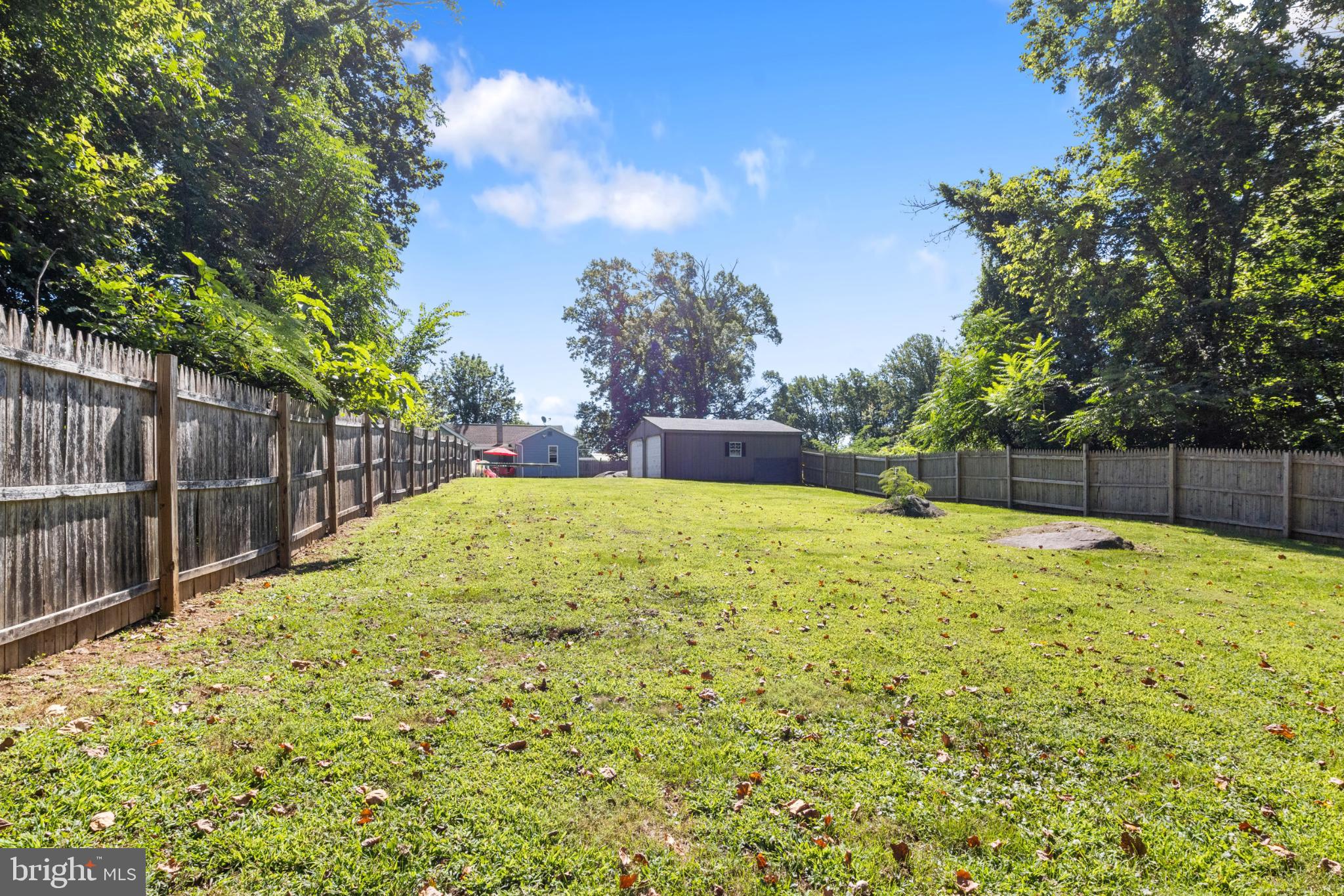 575 Cassel Road Manchester, PA 17345 - Photo 29 of 33 Spacious backyard oasis with lush greenery.