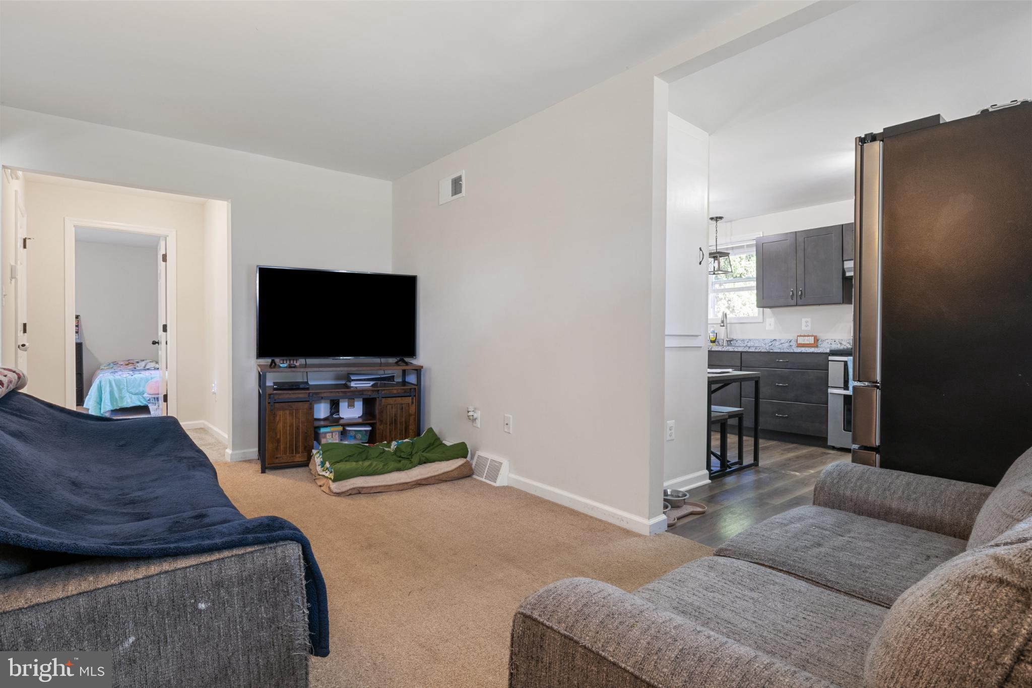 575 Cassel Road Manchester, PA 17345 - Photo 7 of 33 Cozy living space with open kitchen view.