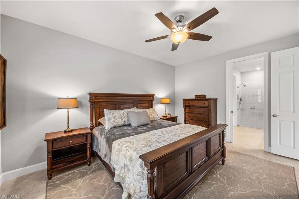 7658 Jacaranda Lane Naples, FL 34114 - Photo 11 of 30 Primary Bedroom connects to the private owners bath
