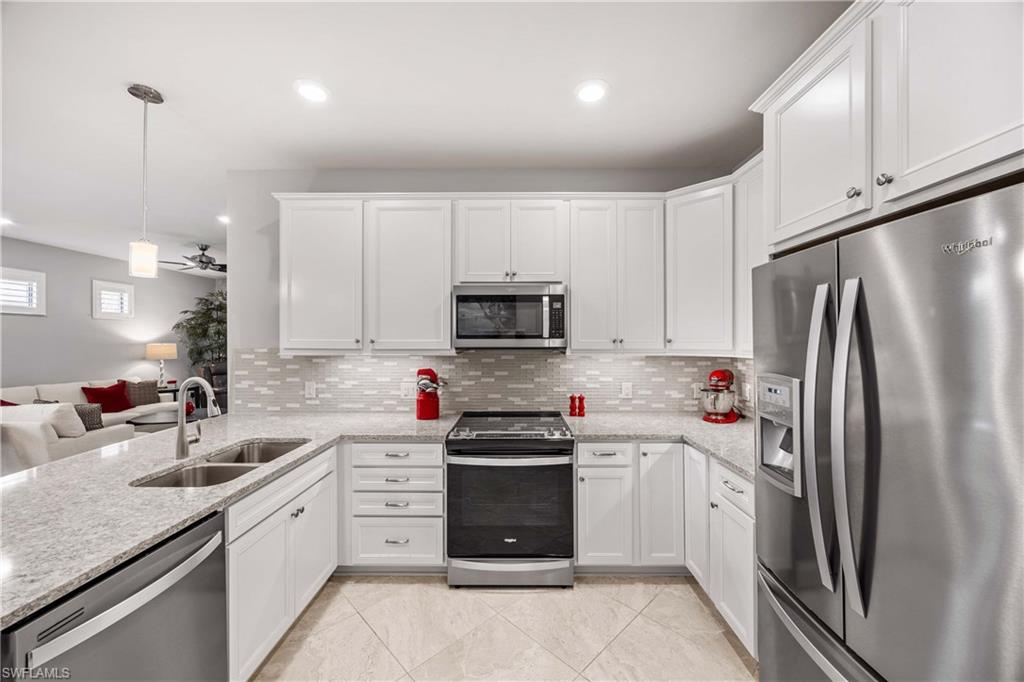7658 Jacaranda Lane Naples, FL 34114 - Photo 7 of 30 Kitchen open and bright