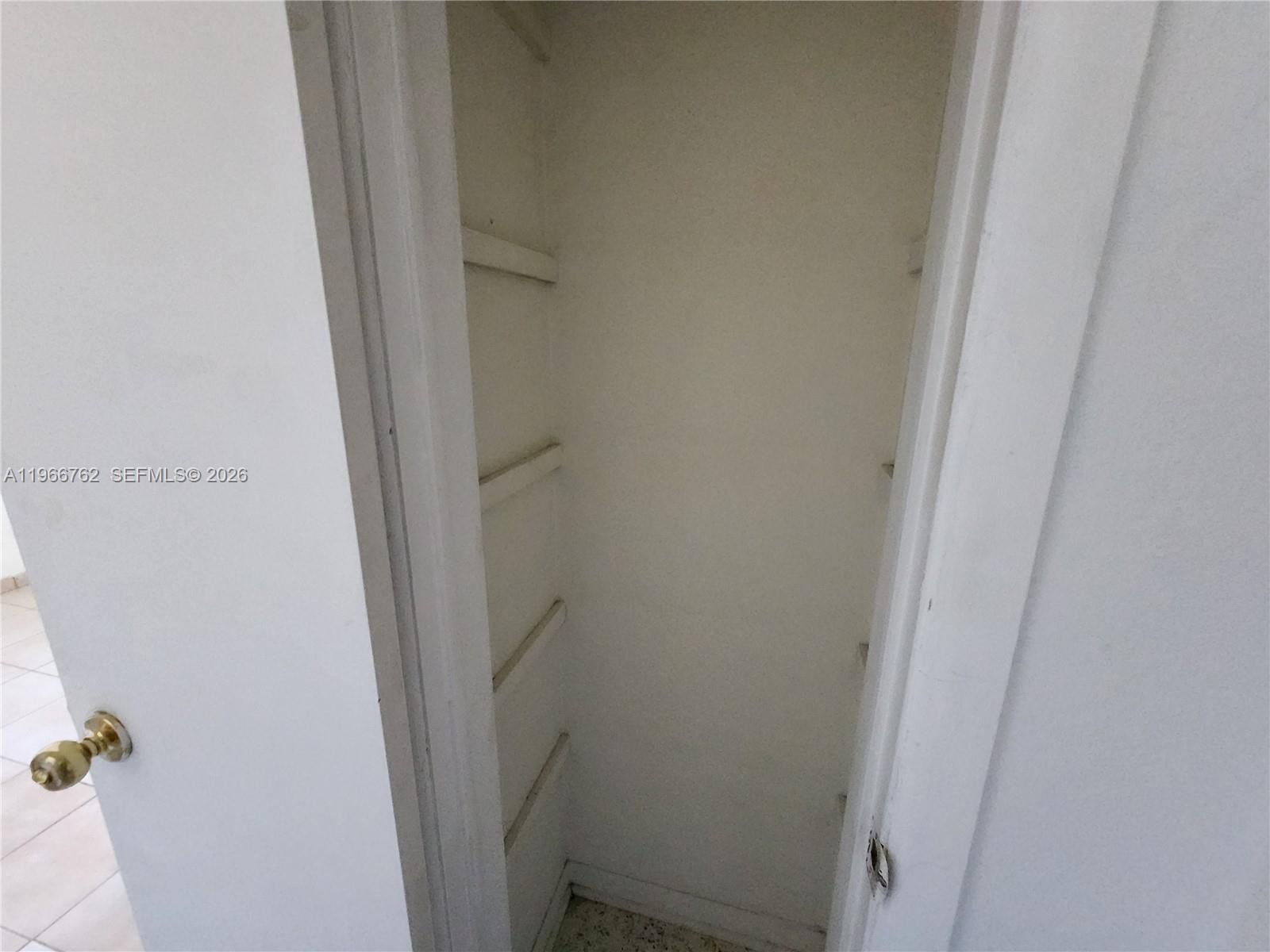 16311 Southwest 102nd Place, Unit A Miami, FL 33157 - Photo 11 of 15 a bathroom with a shower