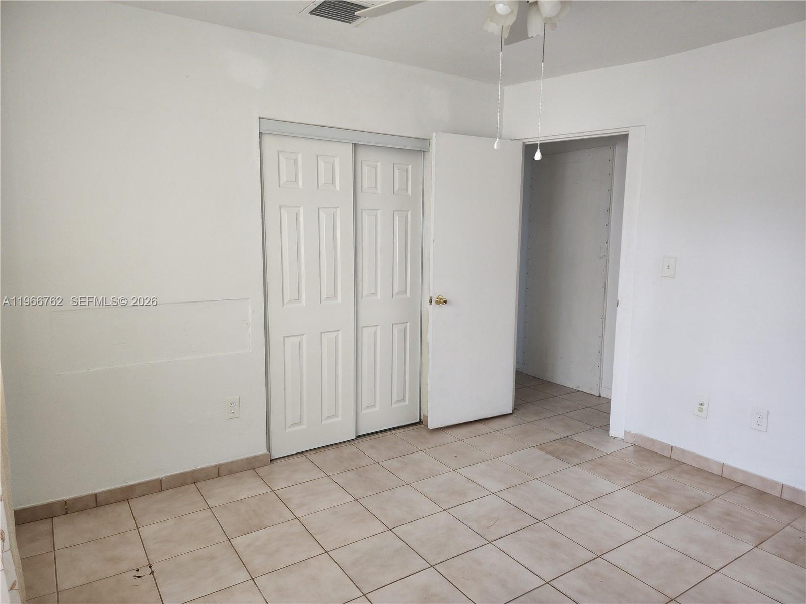 16311 Southwest 102nd Place, Unit A Miami, FL 33157 - Photo 15 of 15 a view of an empty room