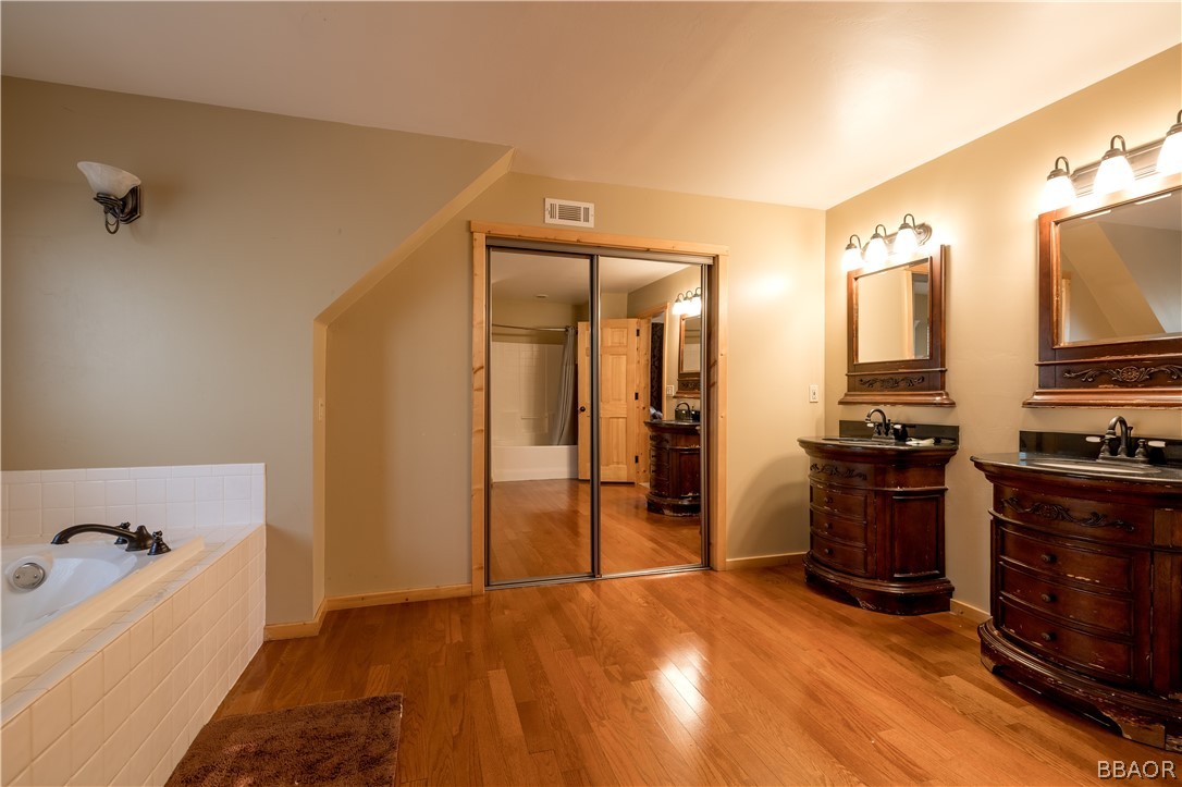 630 Summit Boulevard Big Bear Lake, CA 92315 - Photo 17 of 33 a kitchen with stainless steel appliances granite countertop a refrigerator and a stove top oven