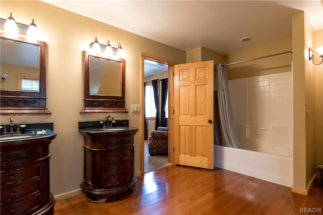 630 Summit Boulevard Big Bear Lake, CA 92315 - Photo 18 of 33 a kitchen with stainless steel appliances granite countertop a refrigerator and a stove top oven