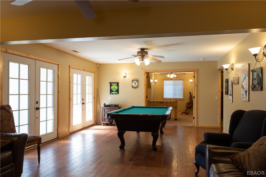 630 Summit Boulevard Big Bear Lake, CA 92315 - Photo 21 of 33 a living room with furniture and wooden floor