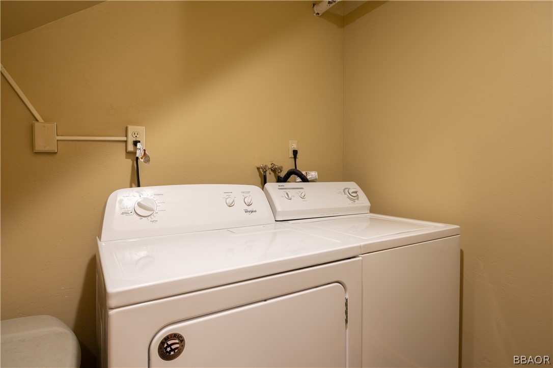 630 Summit Boulevard Big Bear Lake, CA 92315 - Photo 28 of 33 a utility room with dryer and washer