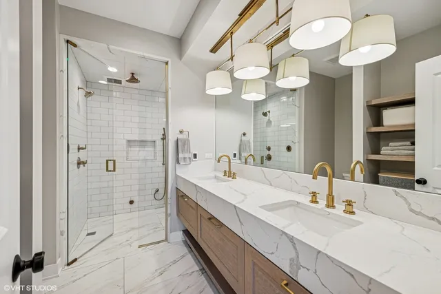 a bedroom with furniture and a book shelf