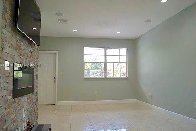 601 Northwest 97th Street, Unit 601 Miami, FL 33150 - Photo 1 of 14 a view of an empty room with glass door