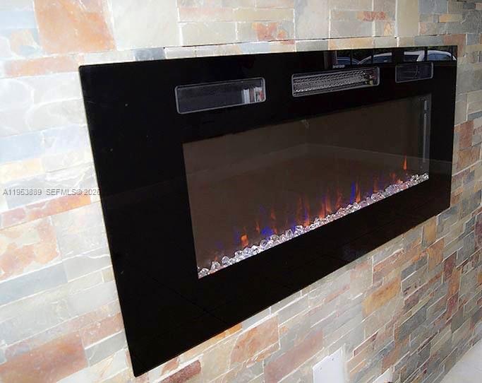 601 Northwest 97th Street, Unit 601 Miami, FL 33150 - Photo 4 of 14 a close view of barbeque