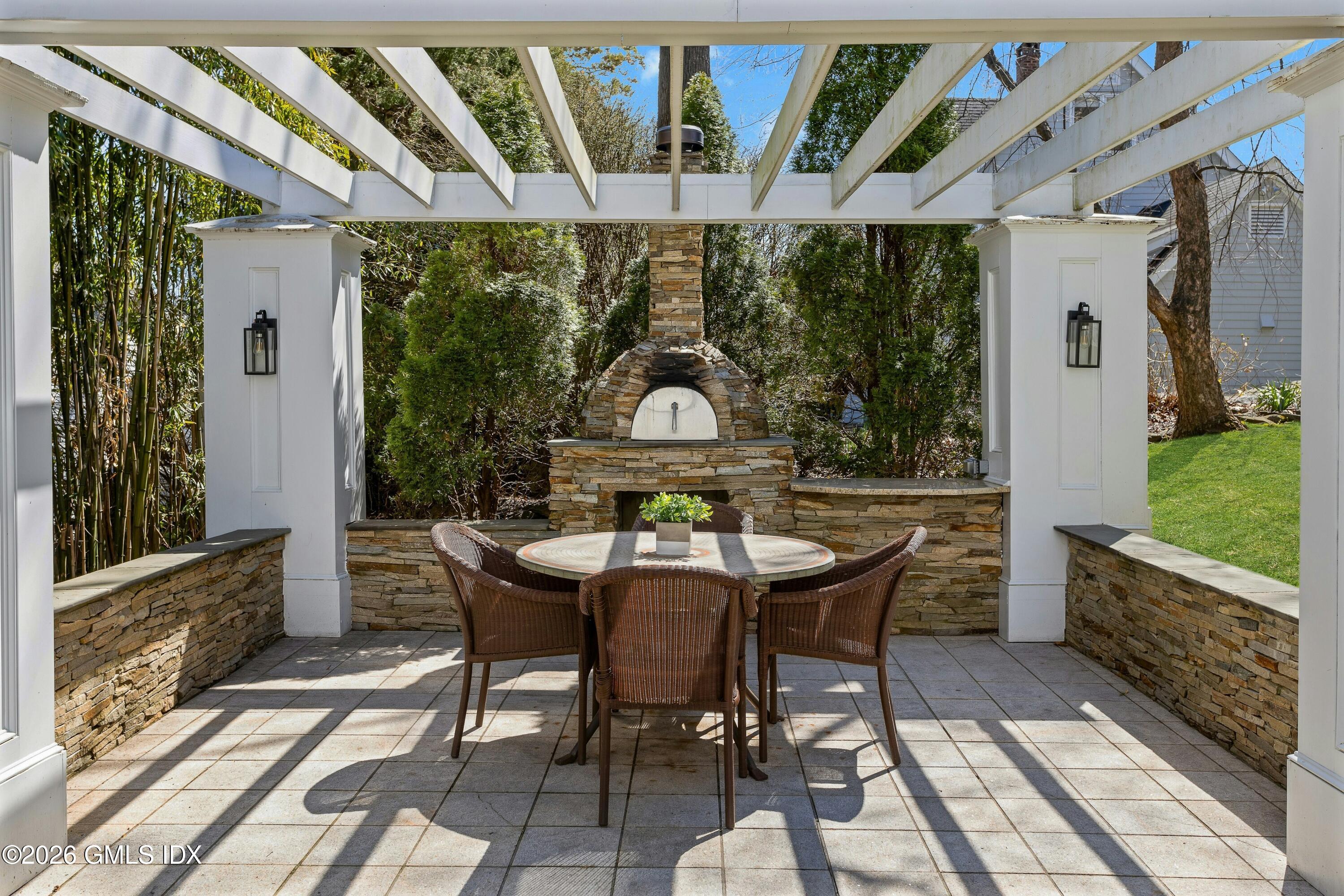 16 Summit Road Riverside, CT 06878 - Photo 27 of 34 a view of a chairs and table in the balcony