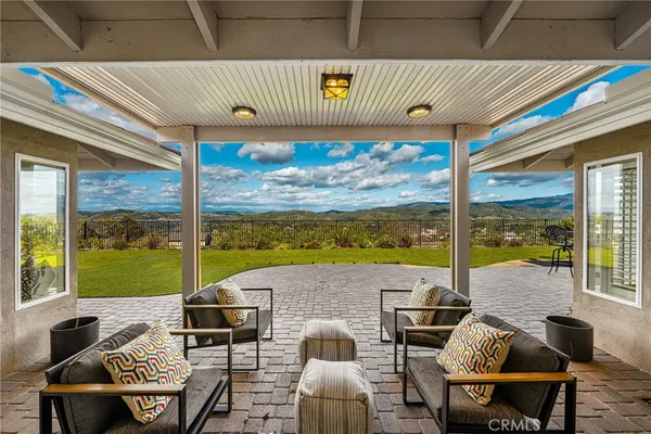 a outdoor space with patio the couches and ocean view