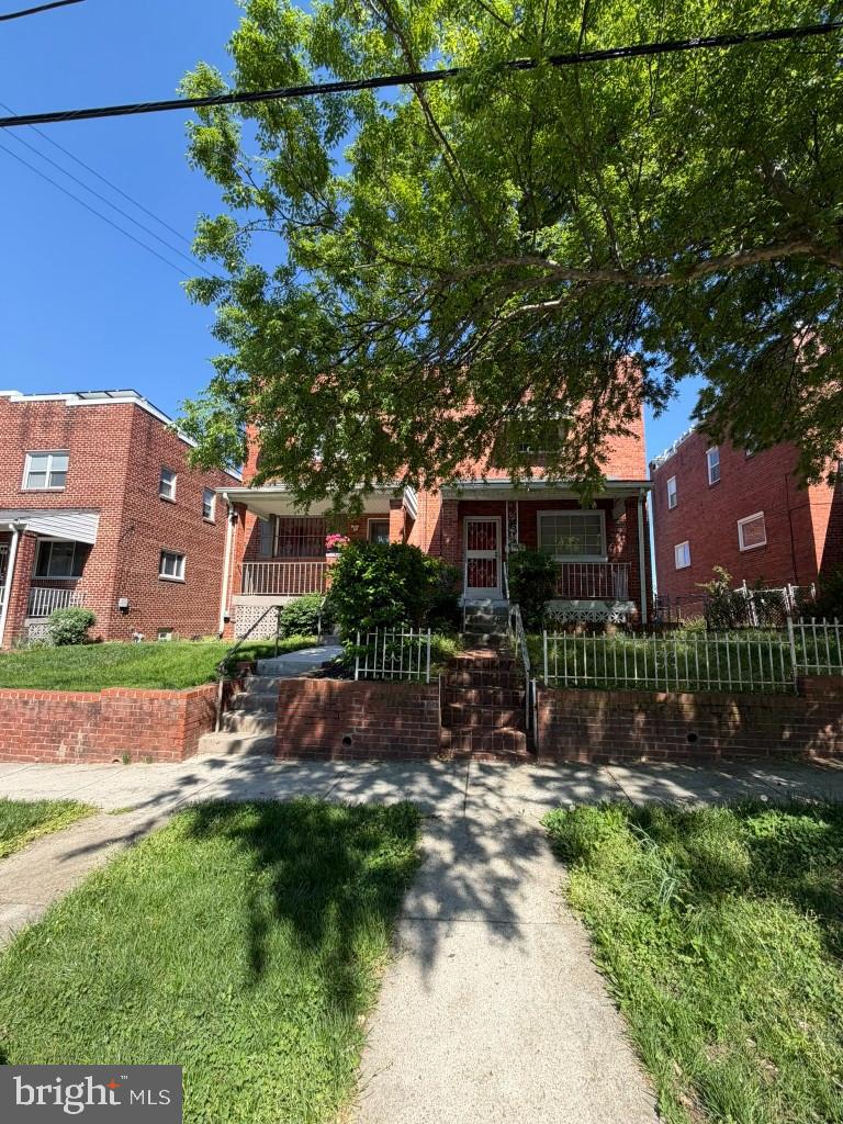 42 54th Street Southeast Washington, DC 20019 - Photo 2 of 7 an outdoor view of a house with a yard