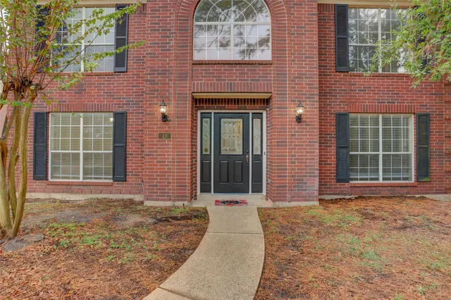 a front view of a house having yard
