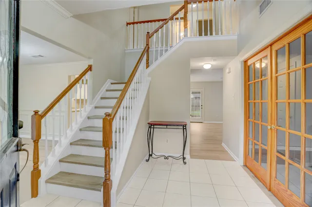 a view of an entryway with staircase