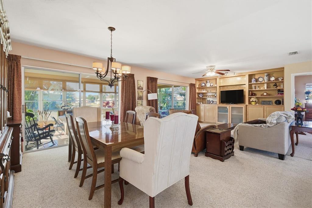 1802 69th Street West Bradenton, FL 34209 - Photo 11 of 31 a dining room with furniture window and outside view