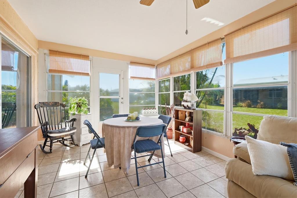 1802 69th Street West Bradenton, FL 34209 - Photo 27 of 31 a living room with furniture and a large window