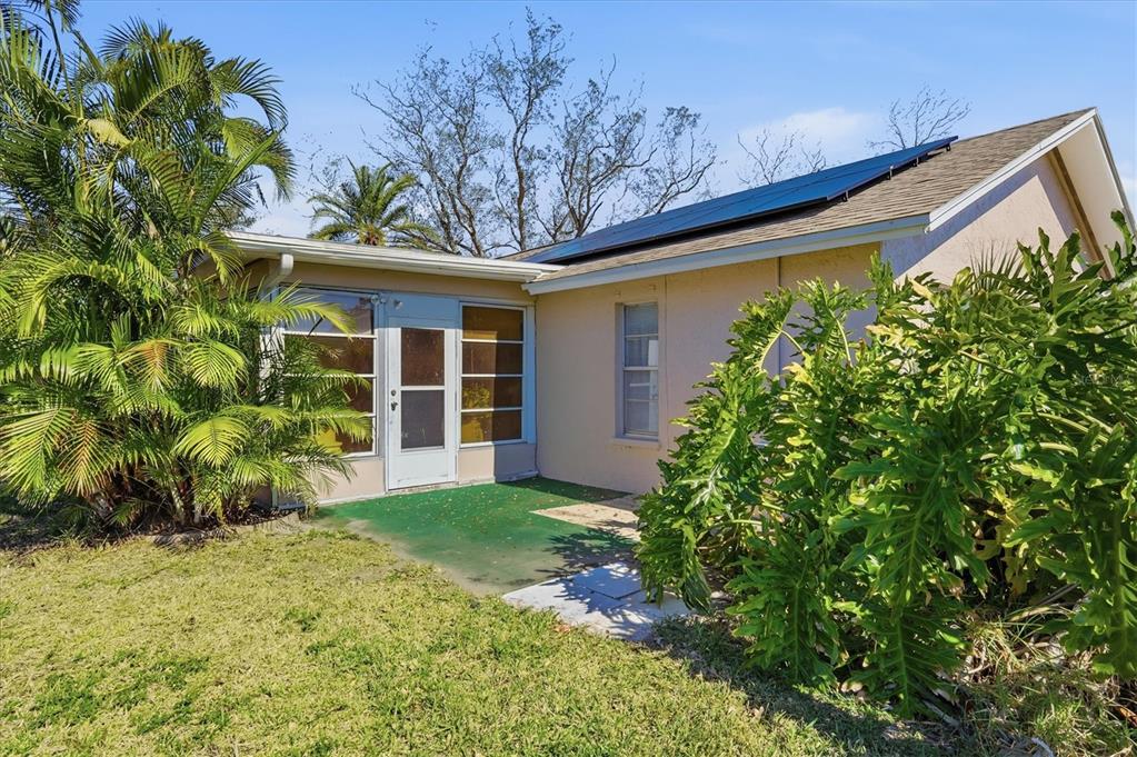 1802 69th Street West Bradenton, FL 34209 - Photo 28 of 31 a view front of house with yard and entertaining space