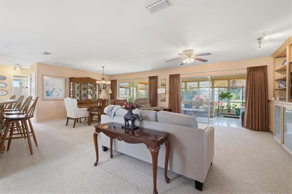 1802 69th Street West Bradenton, FL 34209 - Photo 9 of 31 a living room with furniture and a large window