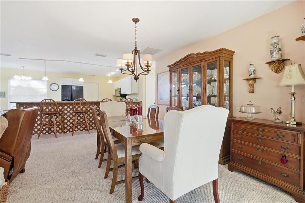 1802 69th Street West Bradenton, FL 34209 - Photo 10 of 31 a large kitchen with a table and chairs