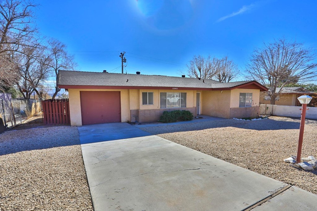 23951 S Road Apple Valley, CA 92307 - Photo 1 of 1 a view of a house with a yard