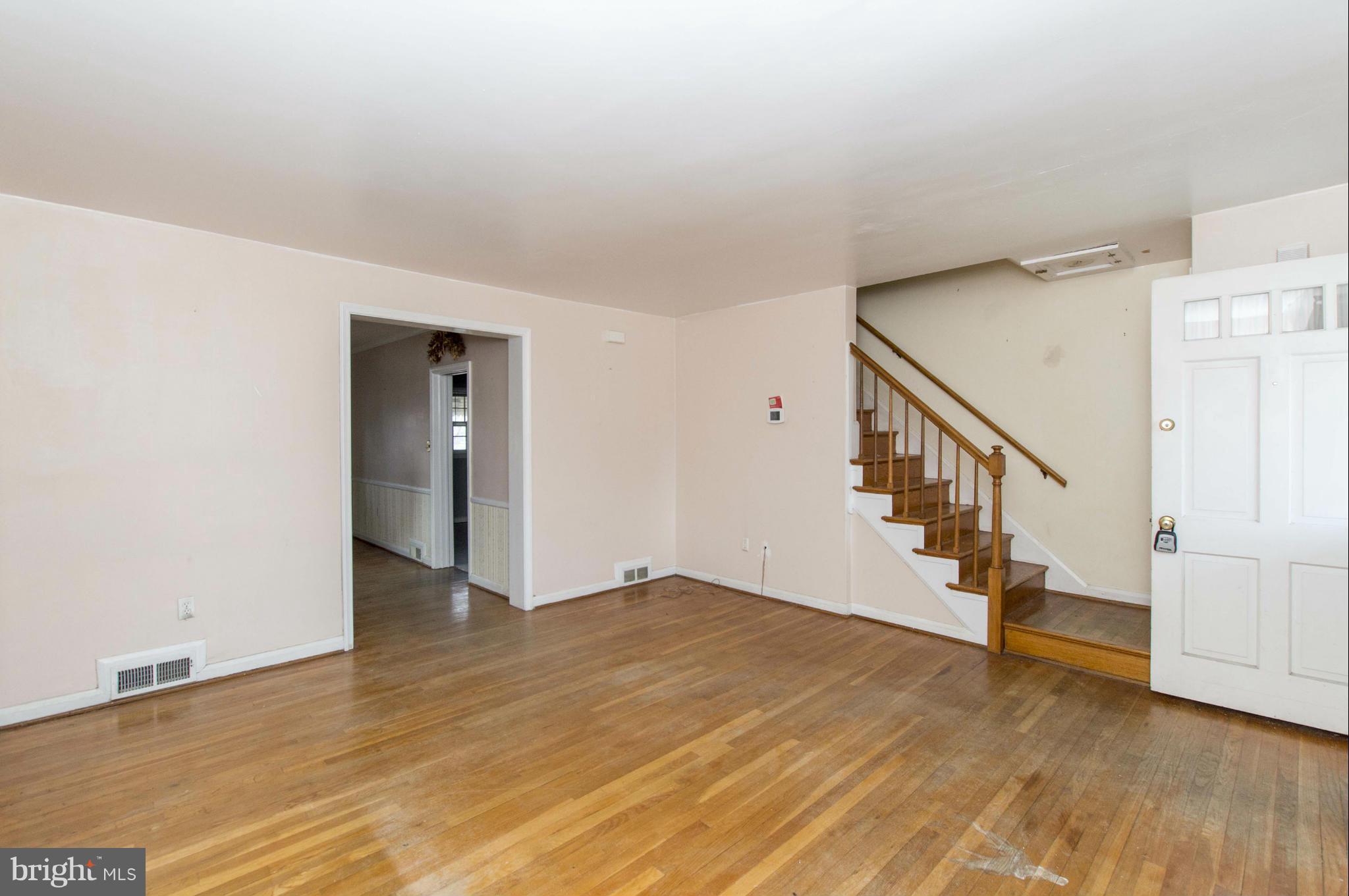 1254 Cedarcroft Road Baltimore, MD 21239 - Photo 5 of 30 a view of entryway and hall with wooden floor