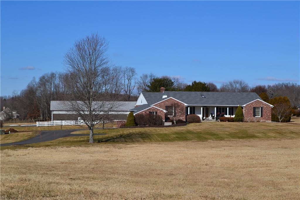 105 Phelps Road East Windsor, CT 06088 - Photo 1 of 1 front view of a house with a yard