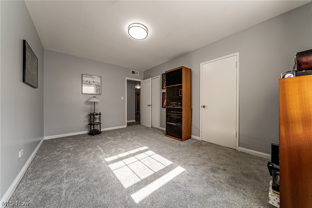 13800 Fairhill Road, Unit 306 Cleveland, OH 44120 - Photo 27 of 48 Large 2nd bedroom with attached office or bonus room and dual access, ideal as a private suite or 4th bedroom option.