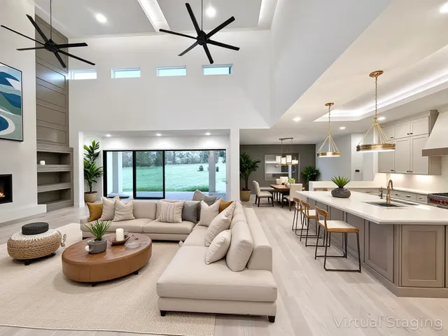 a kitchen with stainless steel appliances granite countertop a kitchen island a stove a sink and a microwave