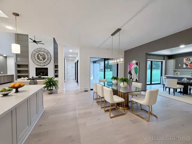 a large spacious bathroom with a double vanity sink mirror and bathtub
