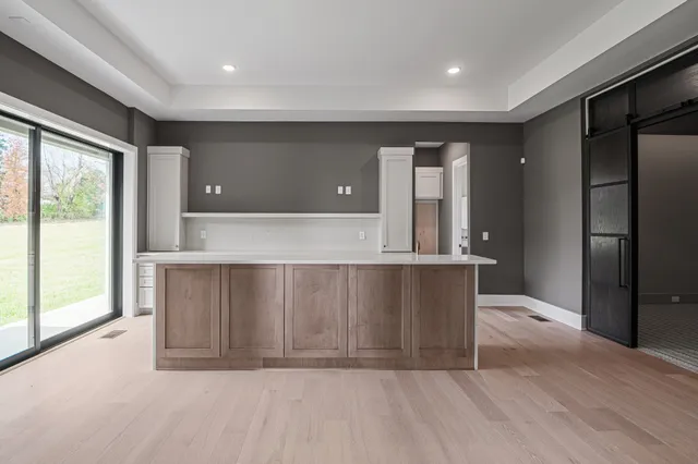 a white bath tub sitting in a bathroom