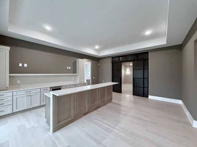 a bathroom with a double vanity sink mirror and double