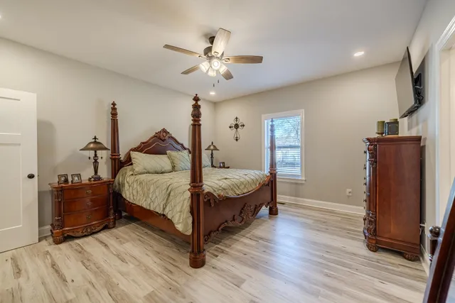a bathroom with a bathtub and a sink