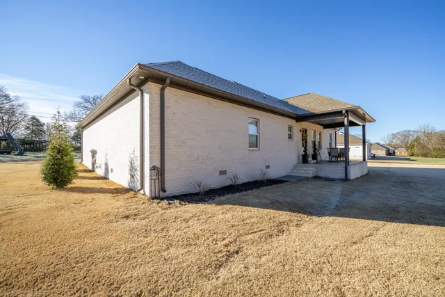 a front view of a house with a porch