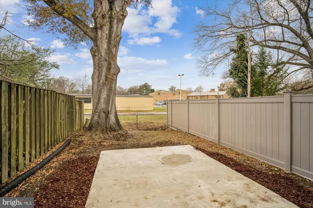 a view of a backyard of the house